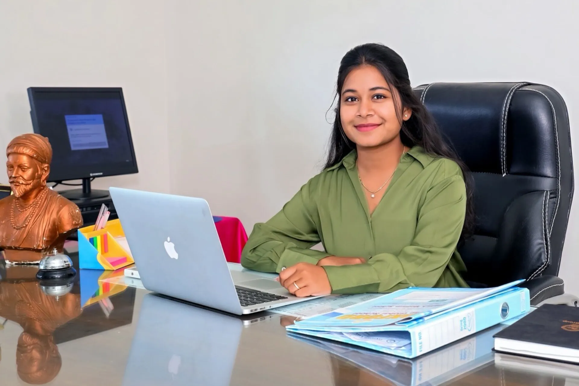 Ms. Meghna Srinivas Dhyavarshetty, Director of Operations, at their desk