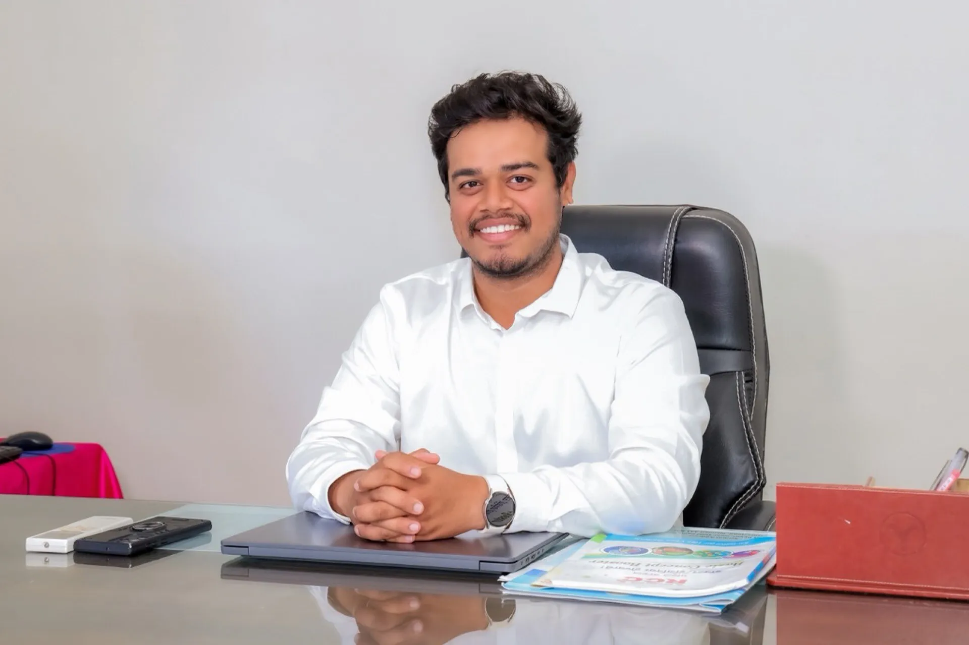Mr. Vishnu Srinivas Dhyavarshetty, Managing Director, at their desk